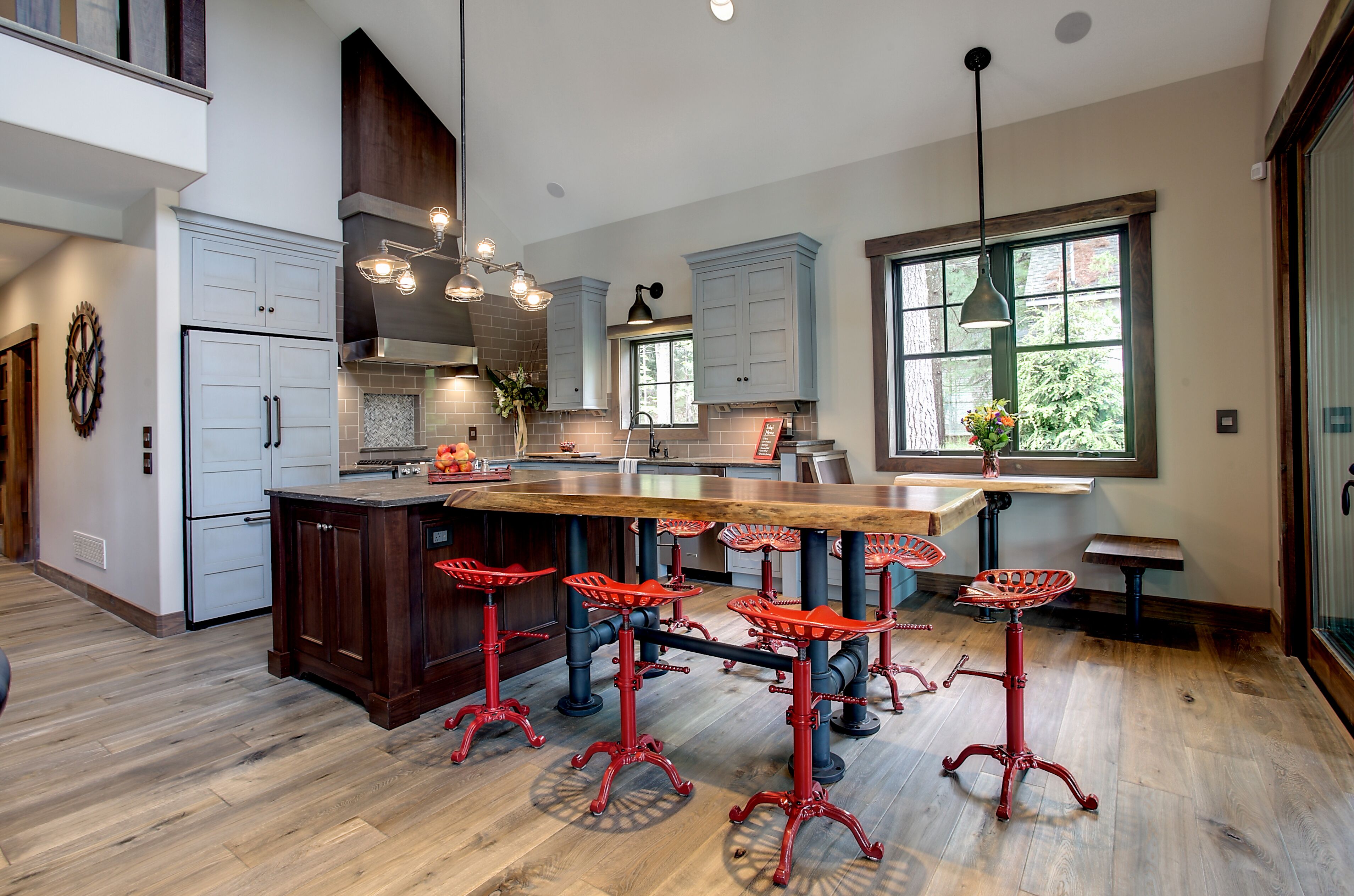 The custom Walnut and Granite Island is the perfect gathering space.  