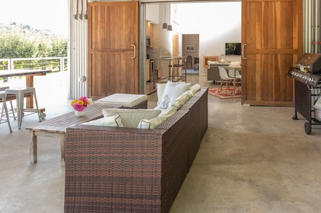 Smart TV, books. Newly Renovated Former Cider House with outdoor covered patio and gas grill.