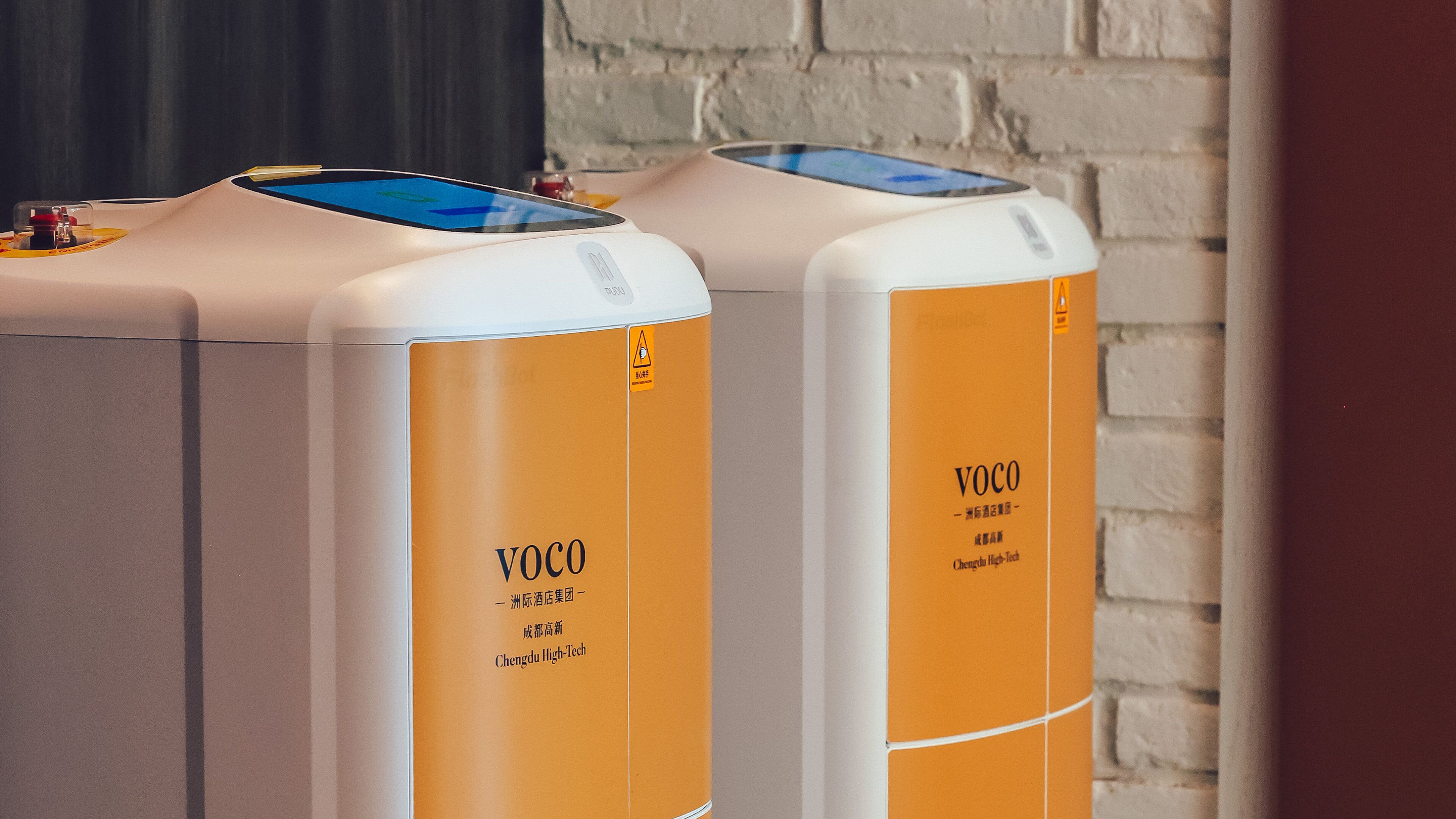 Two vending machines with the brand name 'VOCO' and 'Chengdu High-Tech' on them.