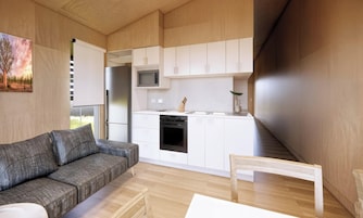 Cabaña superior, 2 habitaciones (Pet Friendly) | Tabla de planchar con plancha, decoración individual, ropa de cama