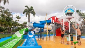 A water park with multiple water slides and splash pads. - Discovery Parks - Townsville (Wulguru)