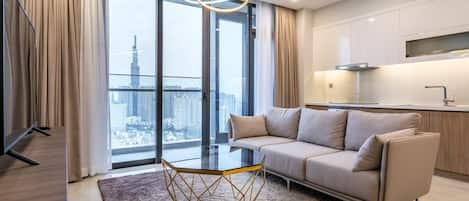 Departamento, 1 habitación | Sala de estar | Smart TV de 40 pulgadas con canales por cable y televisión