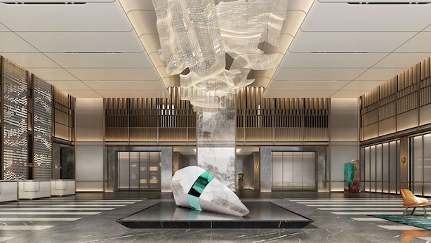 A spacious lobby with a large, abstract sculpture in the center, a reception desk, and a seating area. - WYNDHAM WENZHOU (Wenzhou)