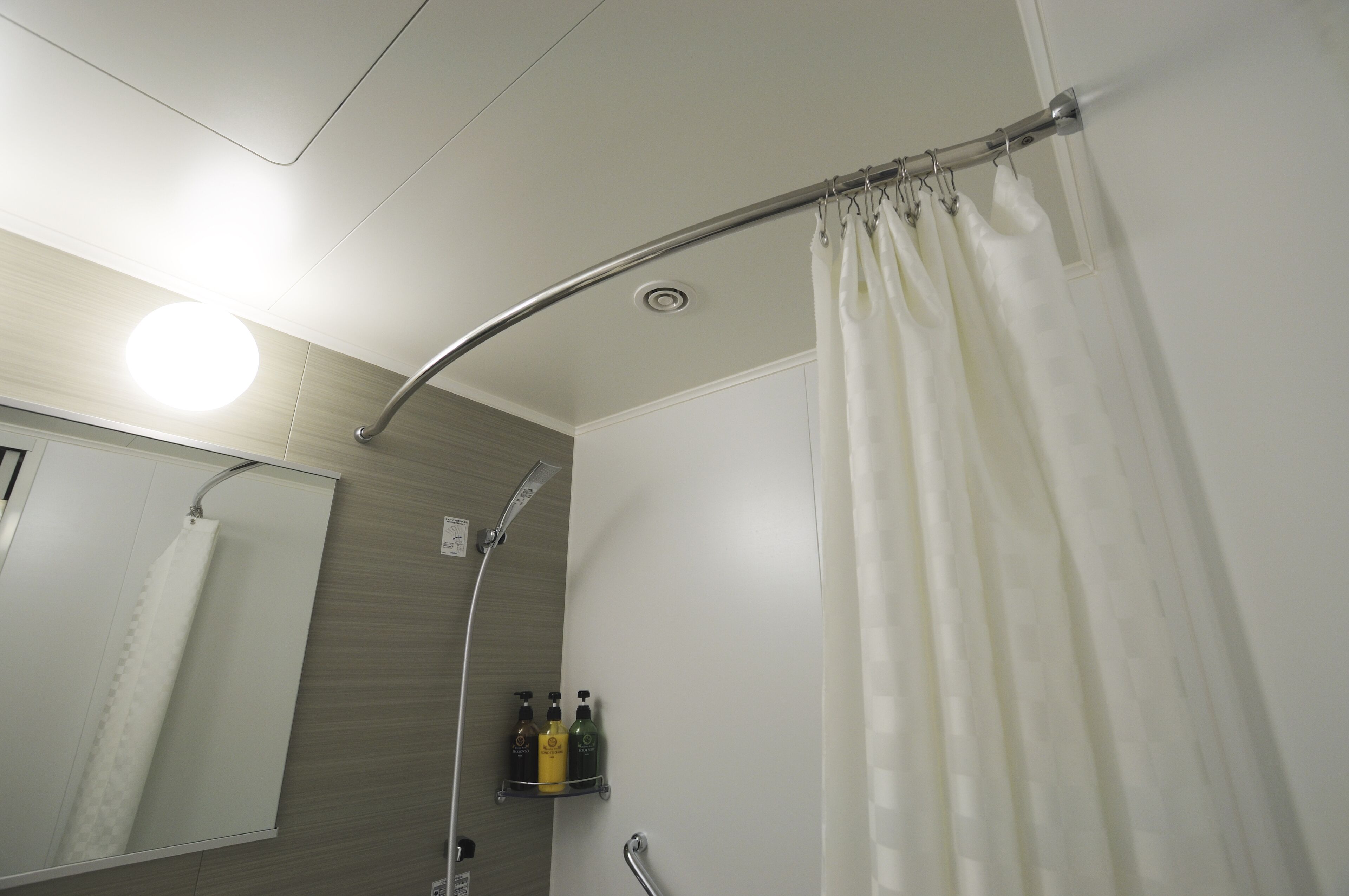 hair dryer, slippers, electronic bidet, towels