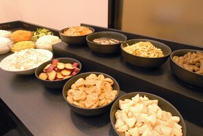A buffet table with various food items including pasta, fruits, and salads. - AB Hotel Kyoto Shijo Horikawa (Kyoto)