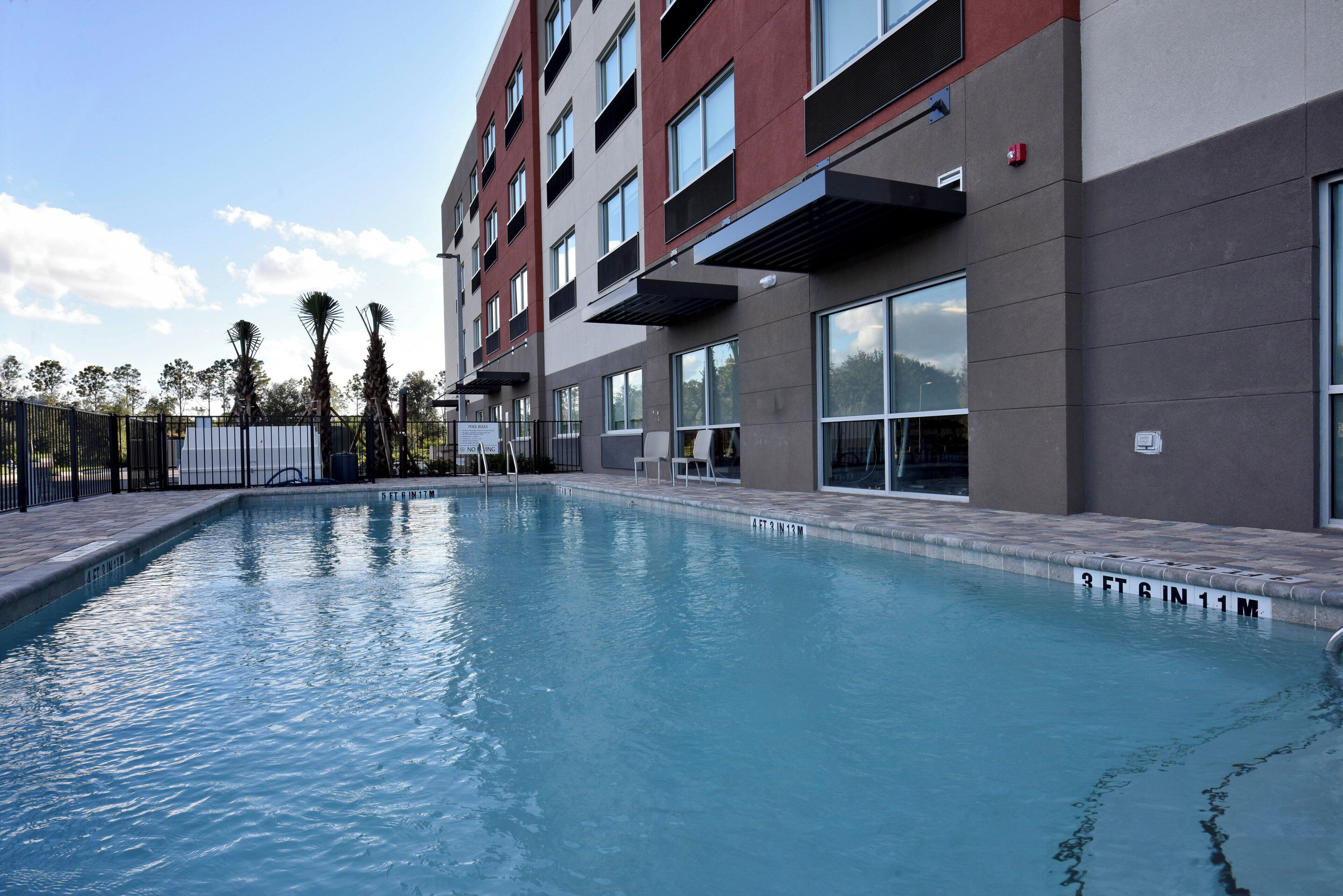 Outdoor pool, open 8:00 AM to 8:00 PM, sun loungers