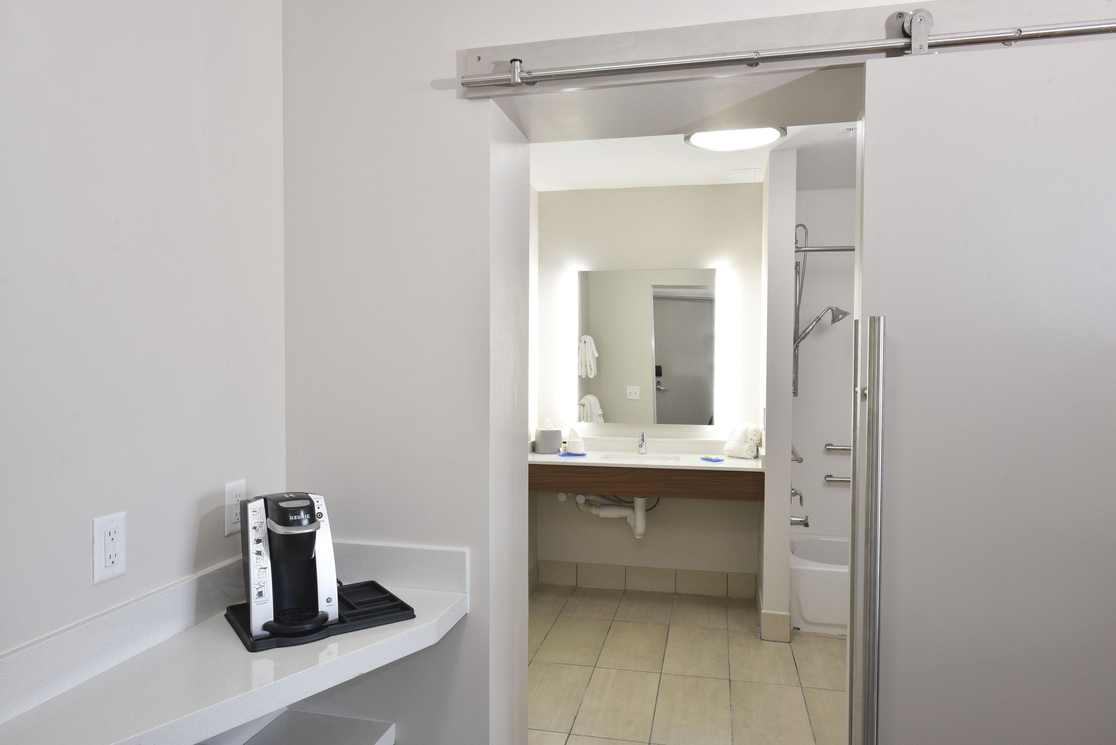 designer toiletries, hair dryer, towels, soap