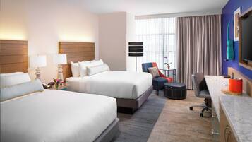 Premium bedding, pillowtop beds, desk, laptop workspace