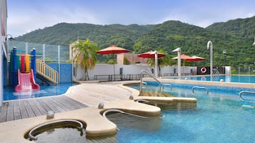 Outdoor pool, open 1:00 PM to 9:30 PM, pool umbrellas, sun loungers