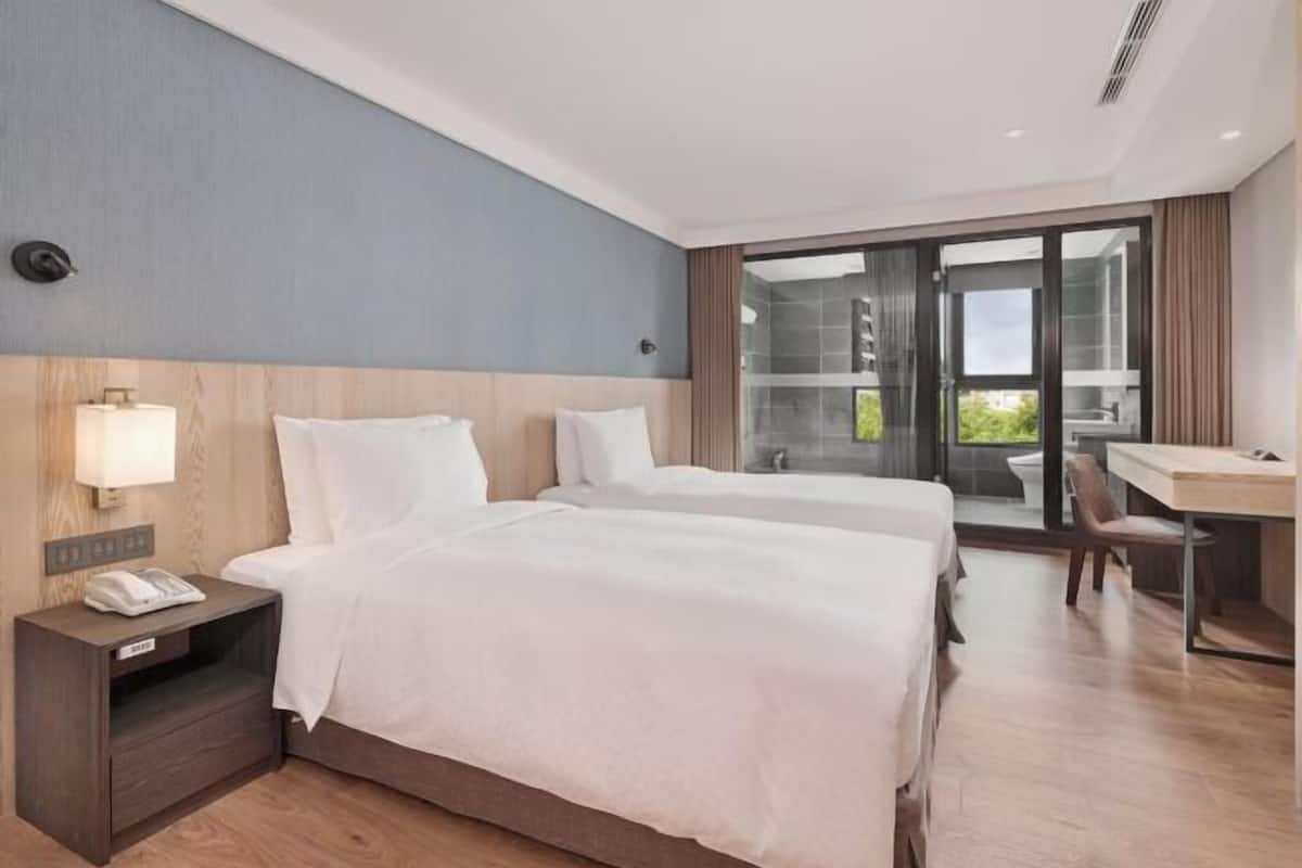 SÀngtillbehör av högsta kvalitet, duntÀcken och minibar