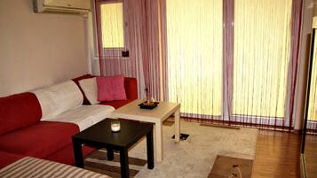 Romantic Apartment, 1 Bedroom, Balcony, Harbour View | Living room | Flat-screen TV