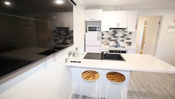 Cabin, 1 Bedroom | Private kitchen | Full-size fridge, microwave, oven, stovetop