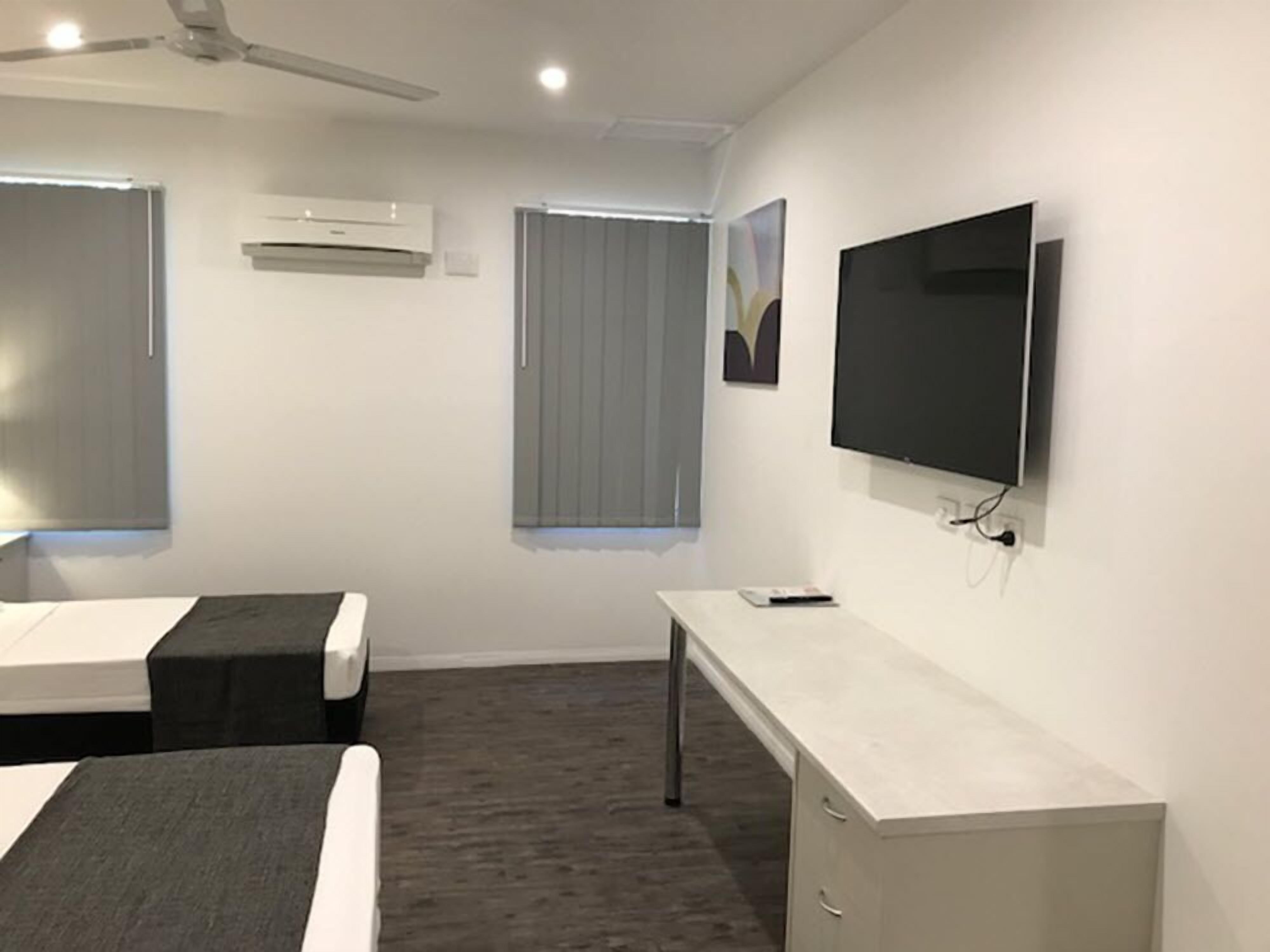 deluxe double or twin room, private bathroom | individually furnished, desk, laptop workspace, blackout curtains