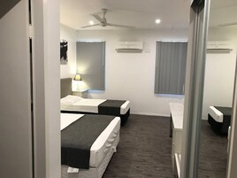 Deluxe Double or Twin Room, Private Bathroom | Individually furnished, desk, laptop workspace, blackout drapes