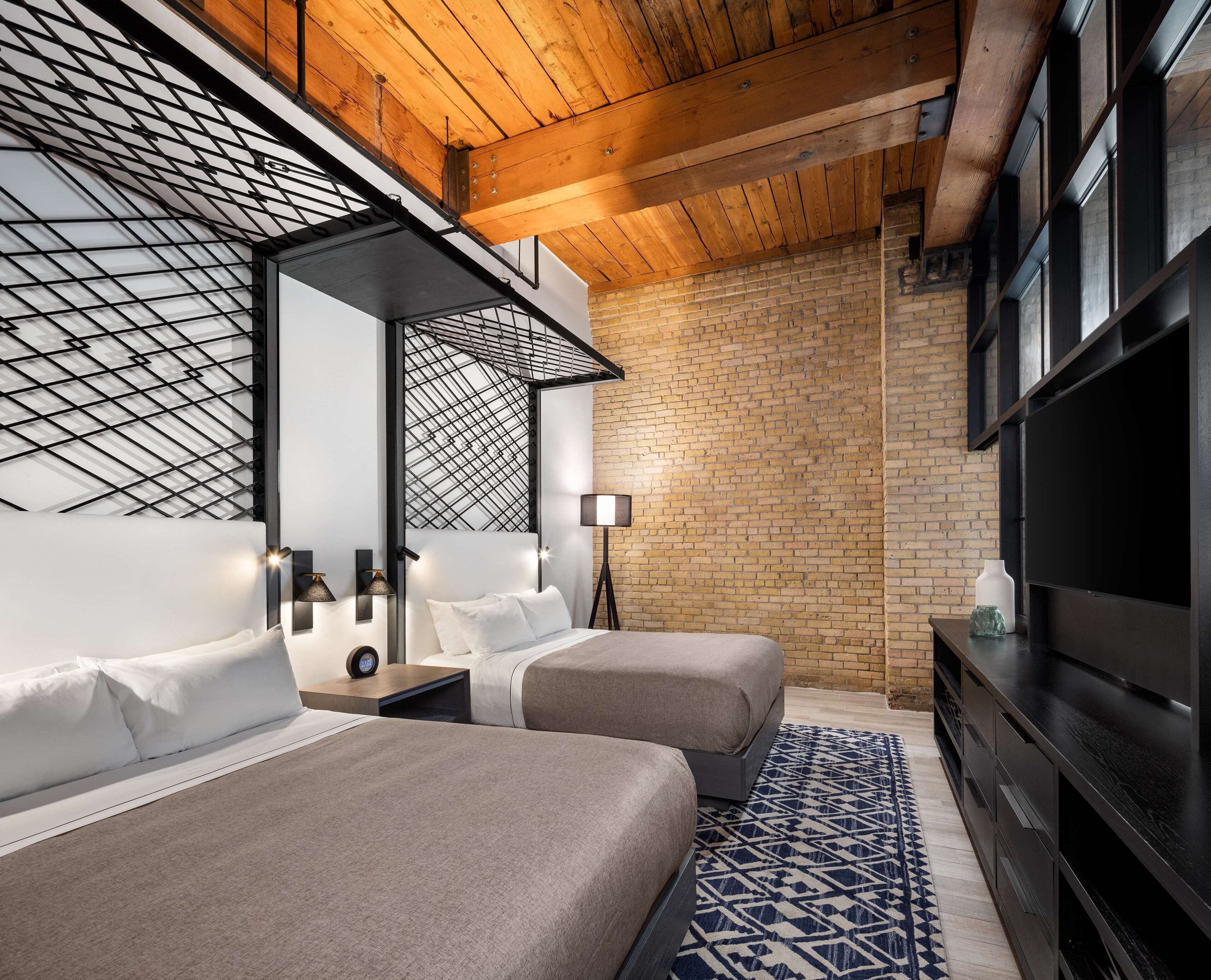 Premium bedding, memory-foam beds, in-room safe, blackout curtains