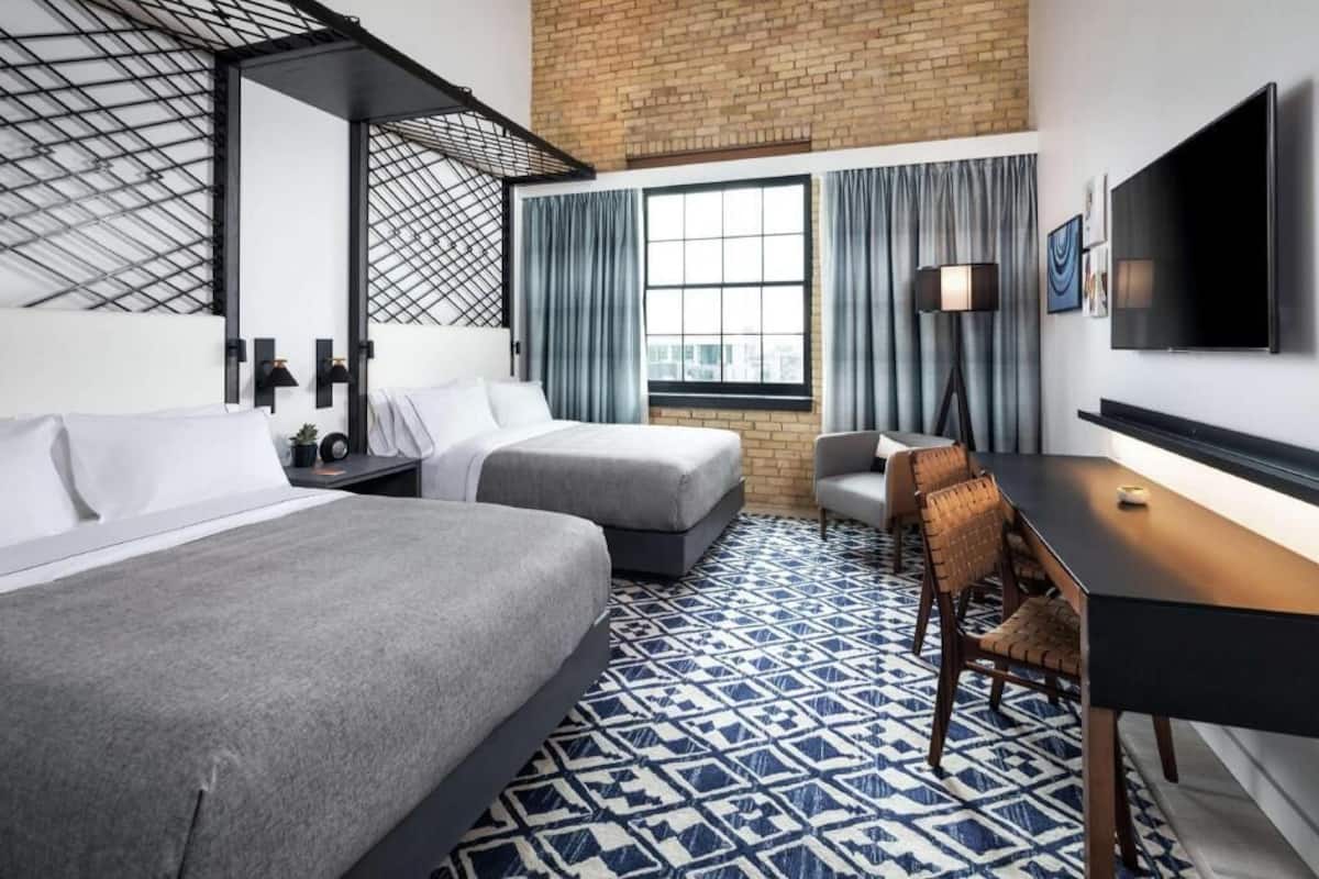 Premium bedding, memory-foam beds, in-room safe, blackout curtains
