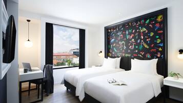 Ropa de cama de alta calidad y minibar