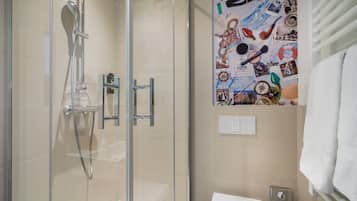 Shower, free toiletries, hair dryer, towels