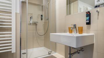 Shower, free toiletries, hair dryer, towels