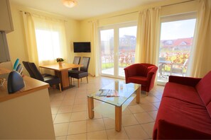 Appartement | Coin séjour | Télévision à écran plat