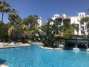 Seasonal outdoor pool, open 10:30 AM to 7:00 PM, pool umbrellas - Jardines Las Golondrinas Elviria (Marbella)