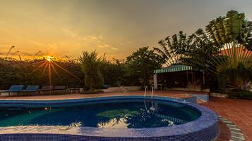 Outdoor pool, sun loungers, lifeguards on site
