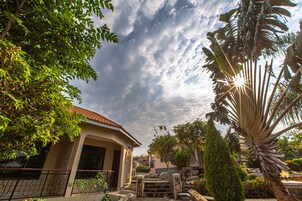 Deluxe Double Room, Garden View | Terrace/patio