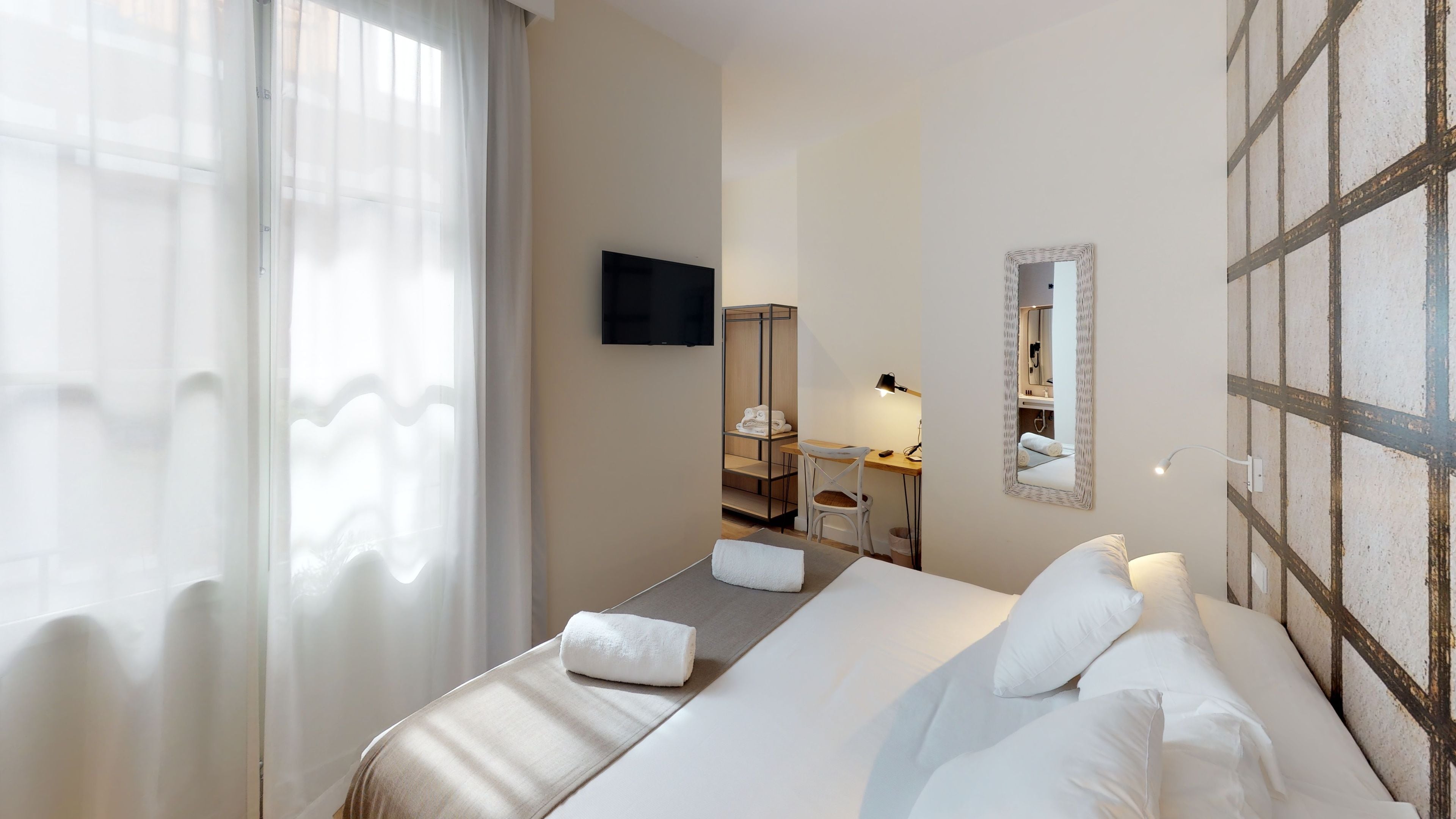 superior double room | living area | flat-screen tv