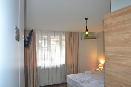 1 habitación, ropa de cama de alta calidad y minibar