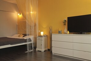 デラックス アパートメント | 高級寝具、防音設備、アイロン / アイロン台、ベビーベッド