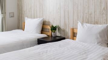 Habitación con 2 camas individuales ( A ) | Escritorio, espacio para trabajar con laptop y wifi gratis