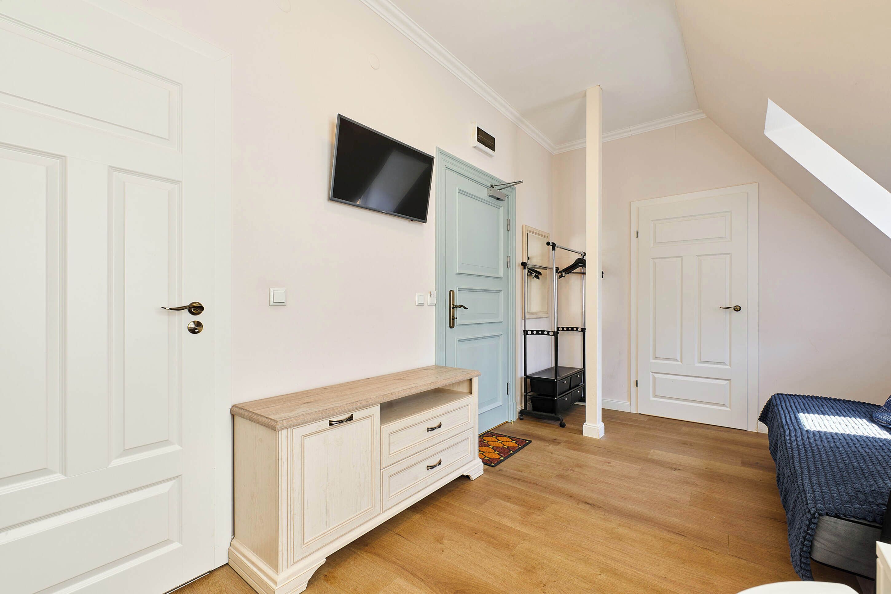 family room | 1 bedroom, premium bedding, minibar, in-room safe