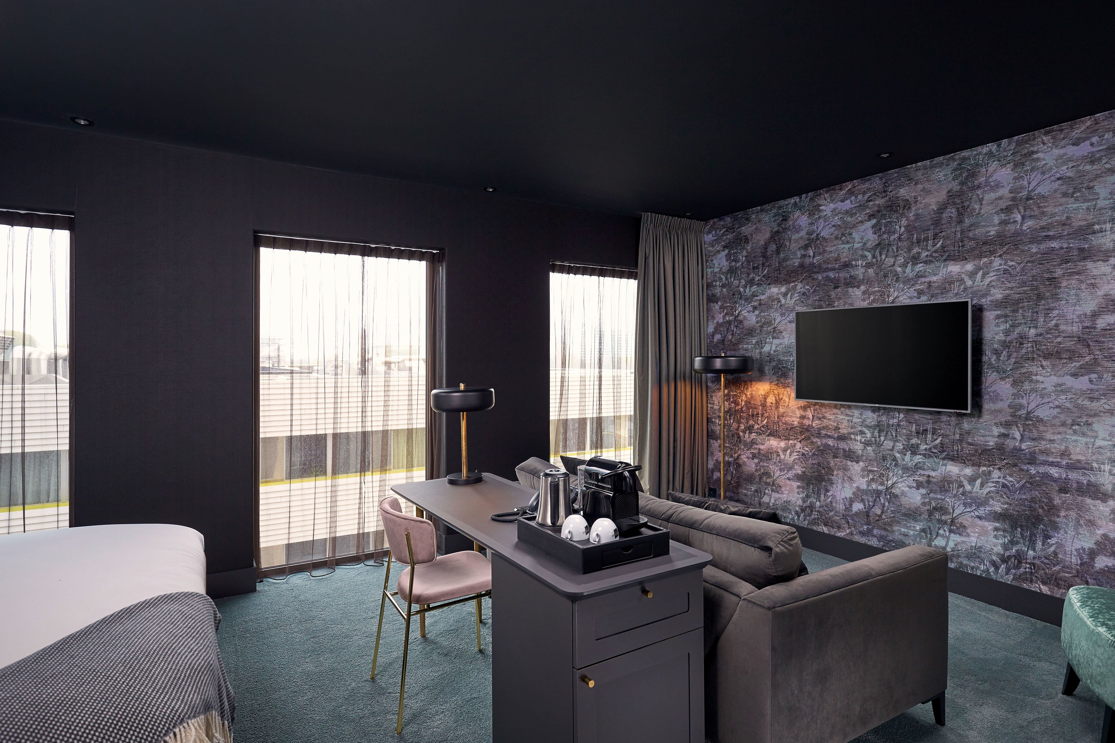 suite | in-room safe, desk, laptop workspace, blackout curtains