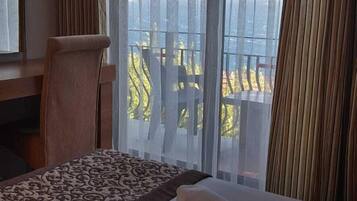 Standard Room, Sea View | Minibar, free WiFi, bed sheets