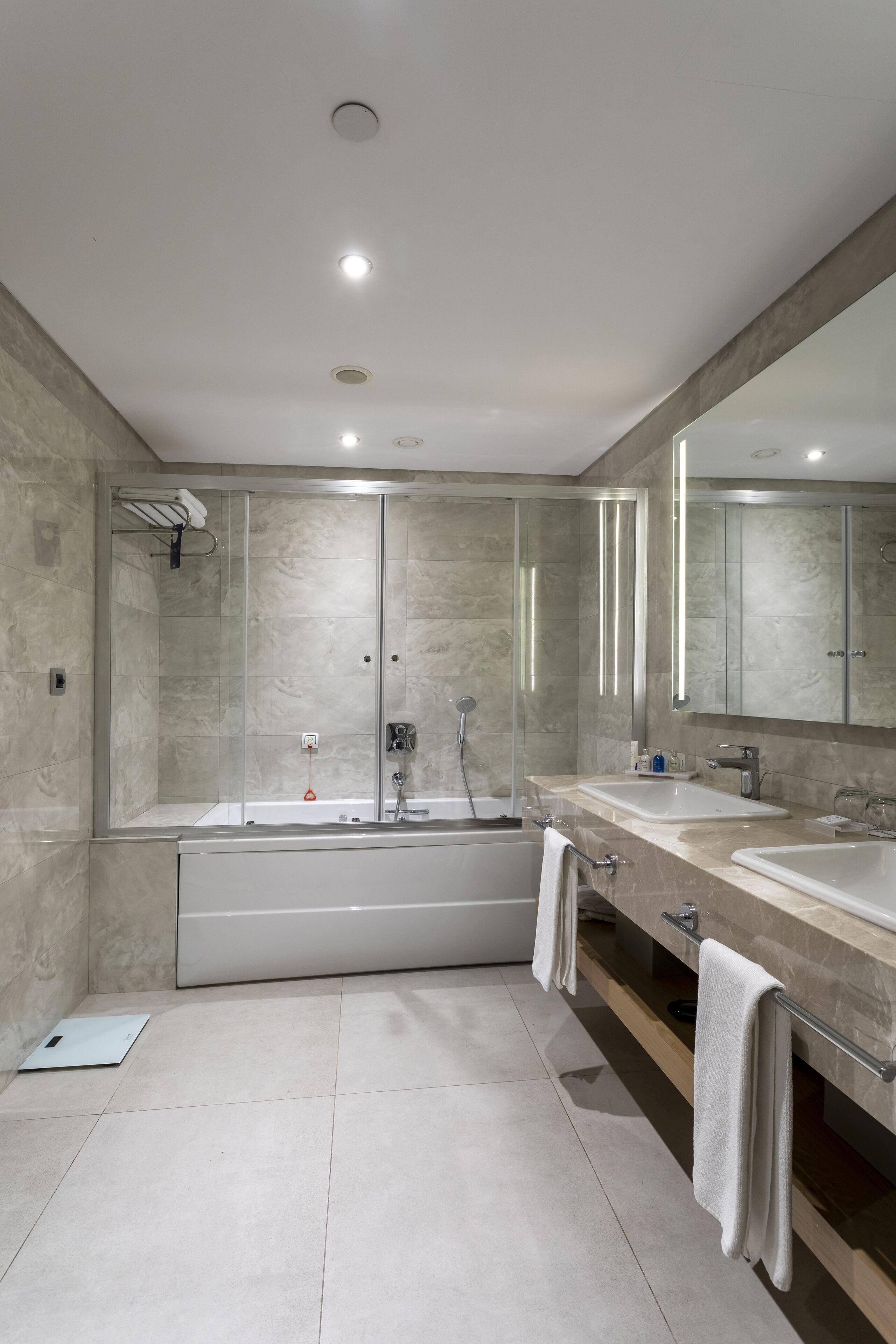 hair dryer, bathrobes, slippers, towels