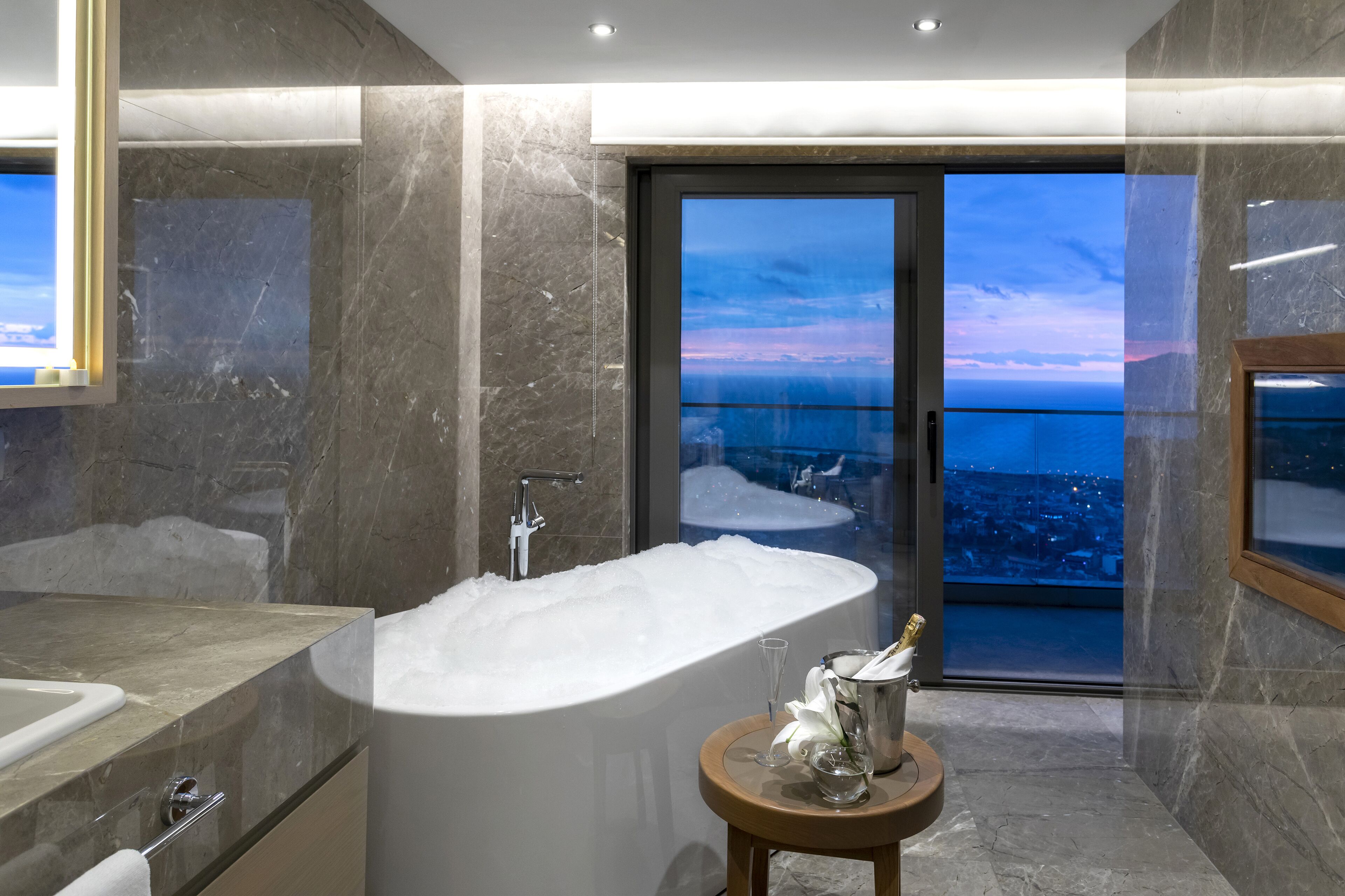 hair dryer, bathrobes, slippers, towels