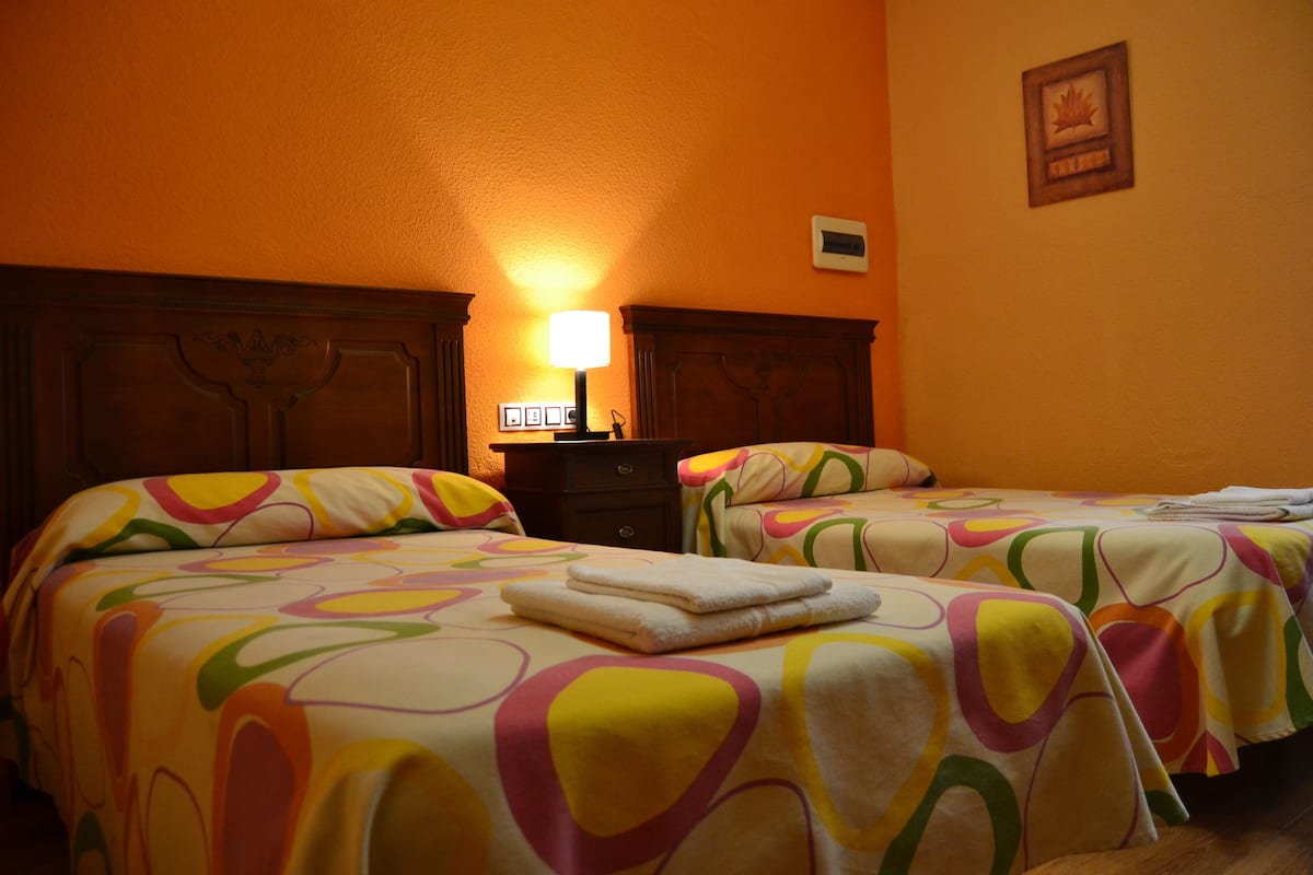 Twin Room (107 Sierra de Duda) | Desk, iron/ironing board (on request), WiFi (free), bed sheets