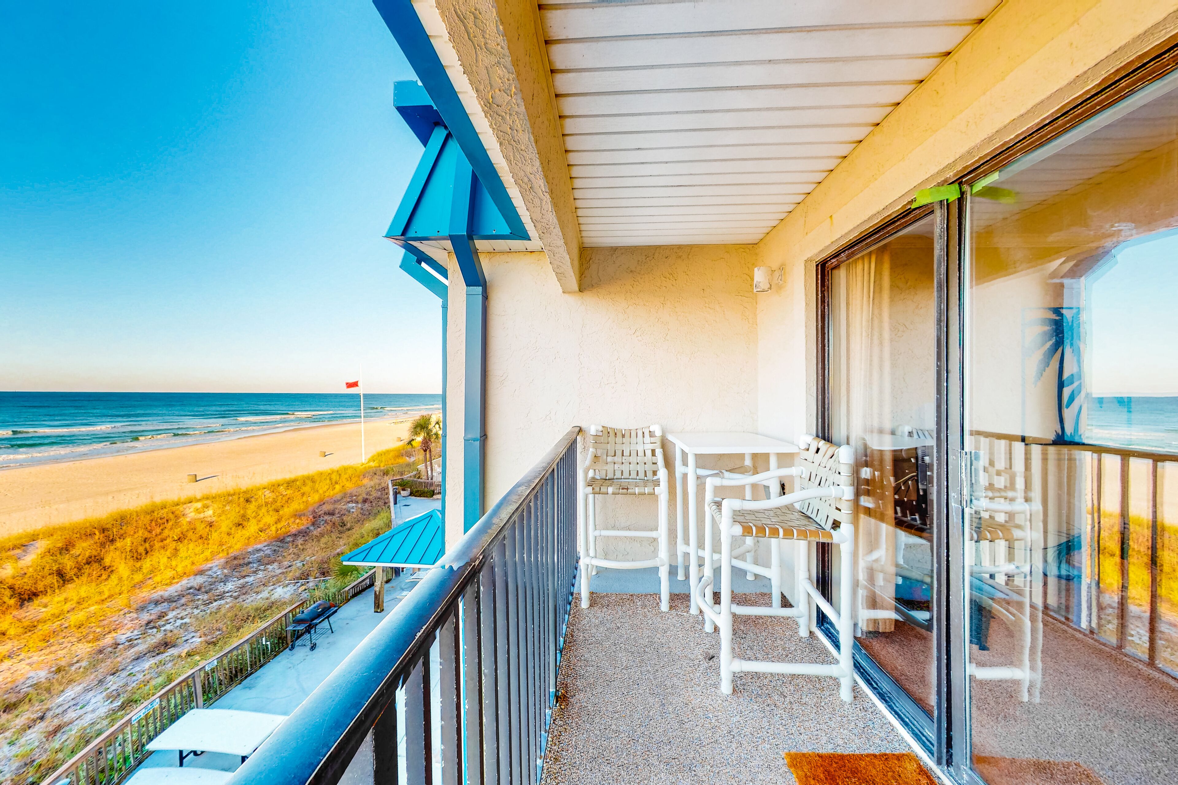 Stylish oceanfront escape with pool, sweeping beach views, & more