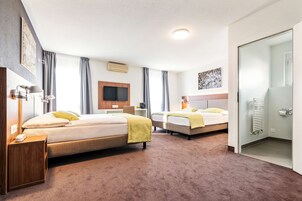 Standard Room, Multiple Beds | Premium bedding, individually furnished, desk, laptop workspace