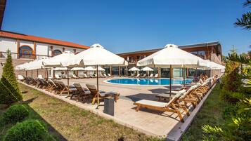 Indoor pool, seasonal outdoor pool, pool umbrellas, sun loungers