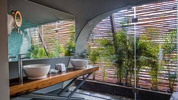 Shower, rainfall showerhead, designer toiletries, hair dryer