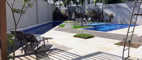 2 outdoor pools, open 9:00 AM to 5:00 PM, free cabanas, pool umbrellas