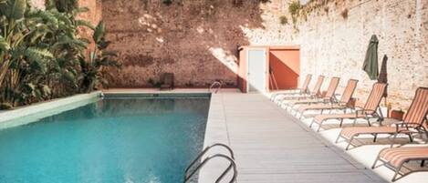 Outdoor pool, sun loungers