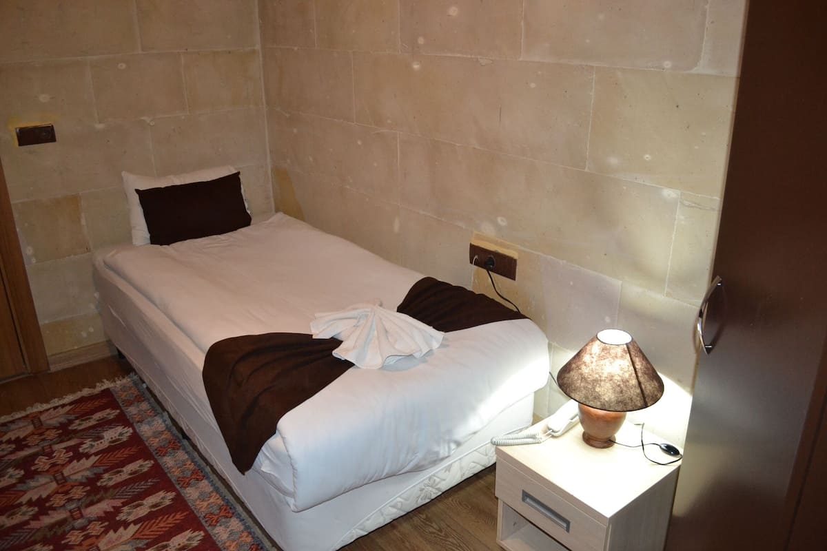 Comfort-Einzelzimmer | BettwÀsche aus Àgyptischer Baumwolle, hochwertige Bettwaren, Minibar