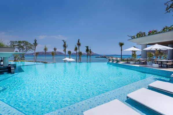 2 outdoor pools, open 8:00 AM to 8:00 PM, pool umbrellas, pool loungers