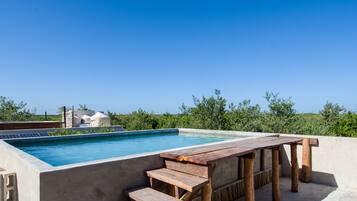 2 albercas al aire libre