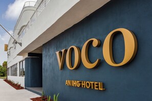 A building with the name 'Voco Anjing Hotel' prominently displayed on its facade. - voco St. Augustine Historic Area by IHG (St. Augustine)