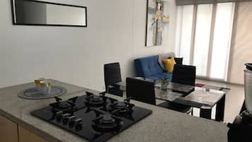 Apartment, 3 Bedrooms | Private kitchen | Fridge, oven, stovetop, coffee/tea maker