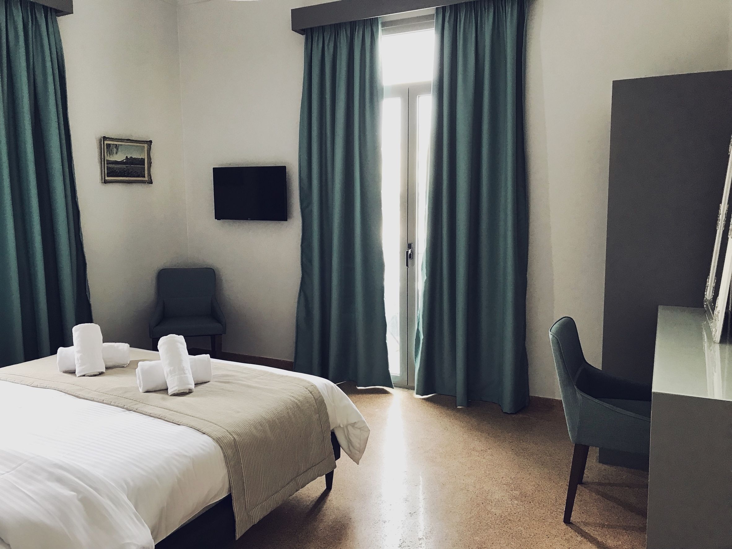 Foto - Mc Queen Rooms & Apartments