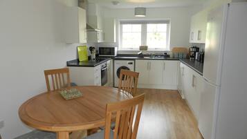 Apartment | Private kitchen | Full-size fridge, microwave, oven, stovetop